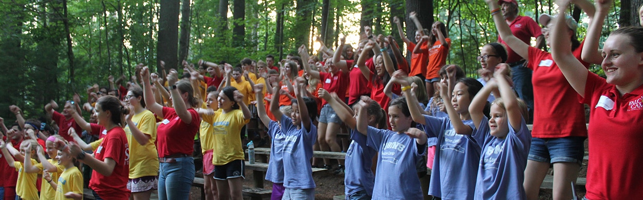 Campers singing together at summer camp