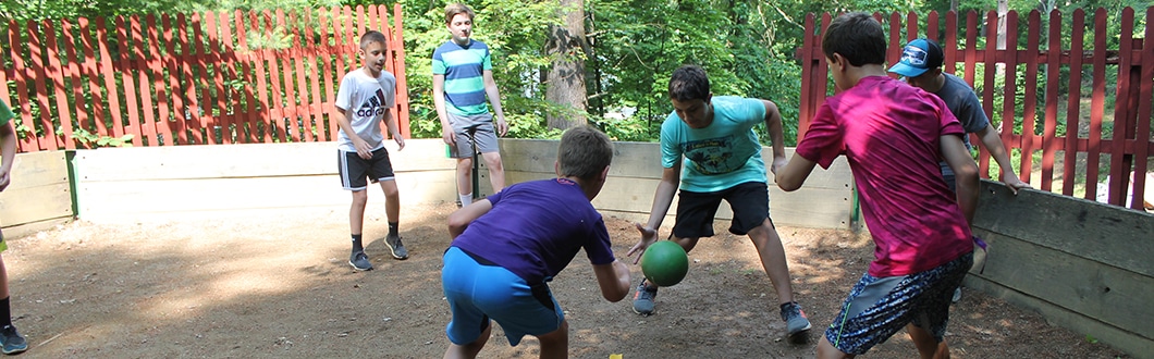 Kids playing ball at summer camp