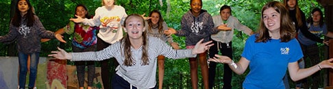 Kids performing a skit at summer camp