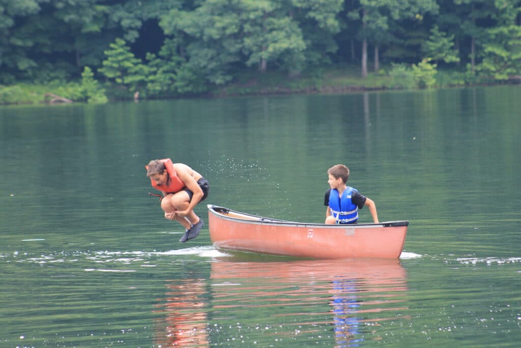 Campers canoeing on Leesville Lake